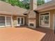 This wooden deck with a fireplace is the perfect space for outdoor relaxation and entertainment at 8443 Marina Bay Ct, Jonesboro, GA 30236