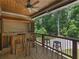 This spacious outdoor kitchen and covered porch is ideal for entertaining at 8443 Marina Bay Ct, Jonesboro, GA 30236
