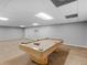 Spacious basement with a pool table, neutral walls and carpet, and recessed lighting at 8443 Marina Bay Ct, Jonesboro, GA 30236