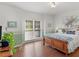 Inviting bedroom featuring wood floors and decor at 8443 Marina Bay Ct, Jonesboro, GA 30236