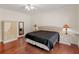 Bedroom featuring hardwood floors and neutral colors at 8443 Marina Bay Ct, Jonesboro, GA 30236