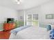 Bright bedroom featuring hardwood floors and decor at 8443 Marina Bay Ct, Jonesboro, GA 30236