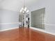 Light-filled dining area with view to living room at 8443 Marina Bay Ct, Jonesboro, GA 30236