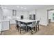Spacious kitchen with a large island, stainless steel appliances, and an open layout at 870 River Cliff Ct, Suwanee, GA 30024