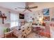 Bright and cheery bedroom with hardwood floors, fun wall decor and a ceiling fan at 905 Foxfire Dr, Lawrenceville, GA 30044