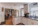 Well-appointed kitchen featuring an island with seating, modern appliances, and easy access to living areas at 905 Foxfire Dr, Lawrenceville, GA 30044