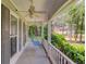 Cozy porch with a swing, offering a tranquil spot to relax and enjoy the outdoors at 905 Foxfire Dr, Lawrenceville, GA 30044