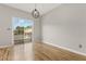 The dining area has hardwood floors and sliding glass doors that lead to a deck at 1122 Cotton Gin Dr, Woodstock, GA 30188