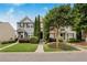 Inviting townhome featuring manicured landscaping and a charming facade at 1122 Cotton Gin Dr, Woodstock, GA 30188
