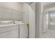 Convenient laundry room with modern washer and dryer units at 1122 Cotton Gin Dr, Woodstock, GA 30188