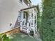 Back porch with steps leading down to the yard surrounded by greenery providing privacy at 237 Libby Ln, Canton, GA 30115