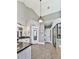 Bathroom featuring granite countertops, tile flooring, a vanity, and a framed mirror at 237 Libby Ln, Canton, GA 30115