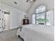 Bright bedroom with vaulted ceiling, a large window, plush carpet, and access to an ensuite bathroom at 237 Libby Ln, Canton, GA 30115