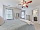 Comfortable bedroom with neutral walls, carpet, dresser, and ensuite bathroom access at 237 Libby Ln, Canton, GA 30115