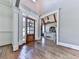 Elegant entryway featuring beautiful hardwood floors and detailed trim at 237 Libby Ln, Canton, GA 30115