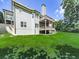 Spacious home featuring a covered deck great for outdoor gatherings and meticulously kept backyard at 237 Libby Ln, Canton, GA 30115