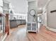 Hallway featuring hardwood floors and natural light at 237 Libby Ln, Canton, GA 30115