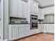 Chef's kitchen featuring updated appliances and ample cabinet space at 237 Libby Ln, Canton, GA 30115
