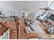 Aerial view of the living room with a fireplace, hardwood floors, and comfortable seating at 237 Libby Ln, Canton, GA 30115