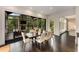 Dining room with large windows looking onto a screened porch at 3773 Randall Se Rd, Atlanta, GA 30339