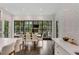Bright, open kitchen with an eat-in dining space and large windows providing scenic views at 3773 Randall Se Rd, Atlanta, GA 30339