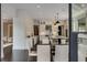 Open concept kitchen featuring a large island, stainless steel appliances, and lots of natural light at 3773 Randall Se Rd, Atlanta, GA 30339