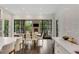 Bright, open kitchen with an eat-in dining space and large windows providing scenic views at 3773 Randall Se Rd, Atlanta, GA 30339