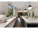 Gourmet kitchen featuring a large island, stainless steel appliances, and subway tile backsplash at 3773 Randall Se Rd, Atlanta, GA 30339