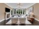 Spacious living room featuring a fireplace and a large window at 3773 Randall Se Rd, Atlanta, GA 30339