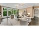 Living room with a large window and modern light fixture at 3773 Randall Se Rd, Atlanta, GA 30339