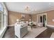 Well-lit living room with a large picture window and cozy seating at 3773 Randall Se Rd, Atlanta, GA 30339