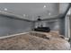 Spacious home theater room with projector and comfortable seating platform for movie nights at 3773 Randall Se Rd, Atlanta, GA 30339