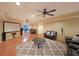 Entertainment basement features a large projector screen and adjacent billiards room at 5617 Asheforde Ln, Marietta, GA 30068