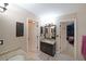 Well-lit bathroom with granite countertops, single vanity, and dark wood cabinets at 5617 Asheforde Ln, Marietta, GA 30068
