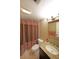 Traditional bathroom featuring a vanity with granite countertop, a toilet, and shower with curtains at 5617 Asheforde Ln, Marietta, GA 30068