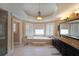 Bathroom boasts a large tub with vanity, standalone shower, and updated fixtures at 5617 Asheforde Ln, Marietta, GA 30068