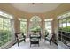 Bright sun room with decorative tile flooring and lots of natural light at 5617 Asheforde Ln, Marietta, GA 30068