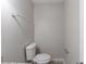 Clean bathroom with a white toilet, simple fixtures, and tile flooring at 1406 Windy Ridge Se Ct, Conyers, GA 30013