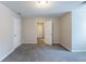 Neutral bedroom featuring carpet flooring and base molding at 1406 Windy Ridge Se Ct, Conyers, GA 30013