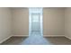 Neutral bedroom with carpet flooring and a natural light at 1406 Windy Ridge Se Ct, Conyers, GA 30013