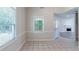 Dining room with white trim and large windows at 1406 Windy Ridge Se Ct, Conyers, GA 30013
