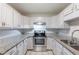 Well-maintained kitchen featuring granite countertops and stainless steel appliances at 1406 Windy Ridge Se Ct, Conyers, GA 30013
