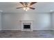 Living room features hardwood floors and fireplace at 1406 Windy Ridge Se Ct, Conyers, GA 30013