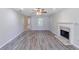 Spacious living room with fireplace and hardwood flooring at 1406 Windy Ridge Se Ct, Conyers, GA 30013