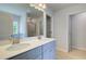 Bathroom featuring double sinks, tile floor, and a large mirror at 19 Camellia Dr, Fairburn, GA 30213