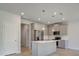Modern kitchen features stainless steel appliances, gray cabinets, and a bright, open design at 19 Camellia Dr, Fairburn, GA 30213