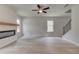 Spacious living room with hardwood floors, fireplace, and lots of natural light at 19 Camellia Dr, Fairburn, GA 30213