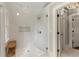 Modern bathroom with a frameless glass shower and decorative lighting at 311 Rolling Rock Se Rd, Marietta, GA 30067