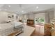 Spacious bedroom featuring wood floors and natural light at 311 Rolling Rock Se Rd, Marietta, GA 30067