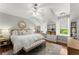 Bright bedroom with a light gray walls and a large bed at 311 Rolling Rock Se Rd, Marietta, GA 30067